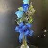 fresh blue roses in vase 