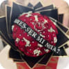 50 red Rosa&rsquo;s with black paper and little crown including banner you