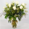 One Dozen White Roses With Filler and Greenery.