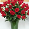 3 dozen red roses in one leaf lined vase makes a huge