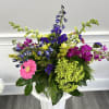 A vibrate eye catching arrangement designed to feel like a burst of