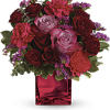 Pure passion. Bedazzle your beloved with luscious red and lavender roses in