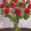 Beautifully arranged Roses your choice of  seasonal colors with lush greens