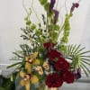 An elevated tropical design blending exotic blooms and rich textures for a