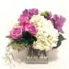 Roses,hydrangeas,long lasting alstromeria and more in a contemporary clear glass cube,
is the