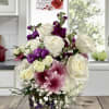 Conveying a sense of luxury and elegance, this arrangement is a truly