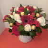 "This designer floral arrangement captures the essence of an enchanted garden. 