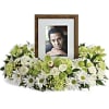 An exquisite round wreath with blooms inspired by the lasting impressions a