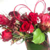 An assortment of red florals with lots of texture.  Perfect for