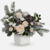 Bring the outdoors in with this forest-inspired bouquet of white roses and
