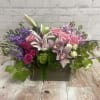 Roses, Lilies, Orchids, Stocks, Hydrangeas, Ivy and greens.(  arrives in a