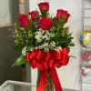 6 Ecuadorian Red Roses combined with matching fillers and bow. 
Any other