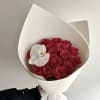 Elegant red rose bouquet featuring premium red roses accented with a white