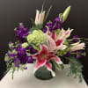 Lilies, Stock, Hydrangeas, green in 6&rdquo;x6&rdquo;cylinder glass vase 