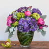 Hydrangea and peonies find this arrangement to be the perfect pops of