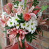 A really pretty floral design with faux &amp; fresh pink and white