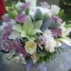 This is a mixture of soft subtle pastel colored blooms including lilies