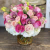 Pretty as can be! this astonishing bouquet includes cymbidium orchids, roses, spray