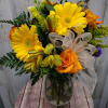 This bouquet is festive and perfect for any celebratory occasion. The arrangement