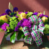 A classic mix of Mardi Gras colored blooms.