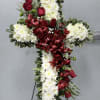 A timeless symbol of faith, love, and hope, our Cross Standing Spray