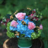 Pretty "scoops" of fresh citrus and blue color hydrangeas. Lovely pastel roses