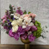 As the word describes it "Divine" this exquisite and fancy flowers arrangement