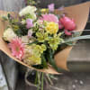 A bundle of fresh flowers in seasonal colors, hand tied and wrapped.


Please