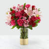 Treat your better half to an arrangement filled with blushing blooms and