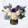 Midnight Stillwater is a refined floral arrangement that balances softness with depth.