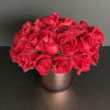 Our stunning large head red roses in a short and lush design.