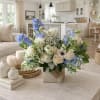 The Sunday Cottage Arrangement captures the effortless beauty of a slow spring