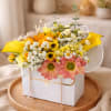Brighten someone&rsquo;s day with this cheerful floral arrangement, handcrafted in Carlsbad, CA.
