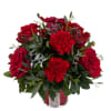 An all red arrangement consisting of roses, carnations, and alstromeria. Designed in