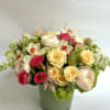 Pastels tone Roses and Ranunculus are the center of this beautiful seasonal