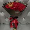 The Rose Bouquet includes 50 long-stem red roses. Wrapped in black paper