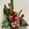 Passion Protea this gorgeous Tropical arrangement uniquely designed with Protea roses tea