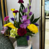 Calla Lily, gladiolus, alstroemeria, carnations, mums, hydrangea, statice