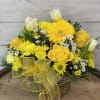 An all yellow basket arrangement of gerbera daisies, solidago, daisies, &amp; roses.