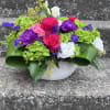 This arrangement has hydrangea, roses, lisianthus, carnations, static and beautiful greenery. 