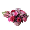 Hot pink roses, light pink roses, pink orchid, pink snapdragons and wax