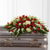The Sincerity Casket Spray is a wondrous presentation of fresh color and
