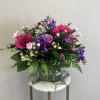 A delightful pink and lavender mix of roses, alstroemeria, hot pink gerbera