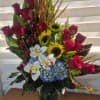  A TALL ONE SIDED EXOTIC ARRANGEMENT IN A 11 INCHES TALL