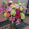 Rainbow Bliss is a luxurious flower arrangement with so much color, texture