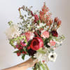 Experience a one of a kind floral arrangement, thoughtfully designed by our