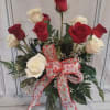 This classic red and white rose is the perfect expression of love