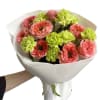 A bright, modern bouquet featuring coral garden-style roses paired with playful lime
