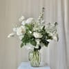 Let our designer put together a beautiful, all-white arrangement.

With a medium height