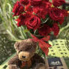 SMALL BEAR, SMALL CHOCOLATES, COMBINED WITH RED ROSES RED CARNATIONS AND RED